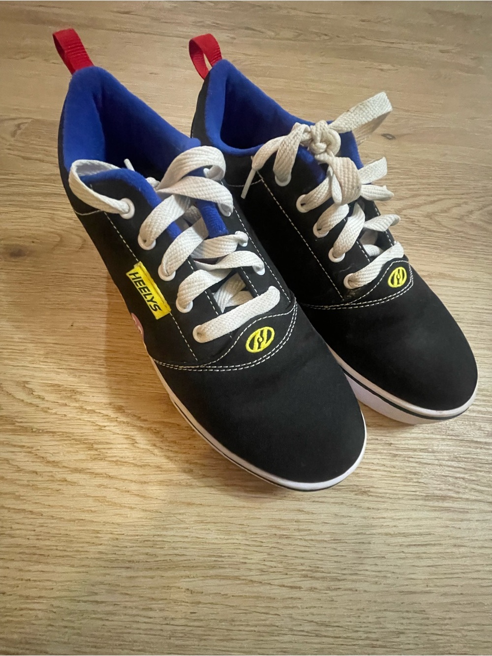 Heelys Black Sneakers with Red, Blue, Orange & Pink Ghost Accents